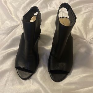 Woman’s black heels